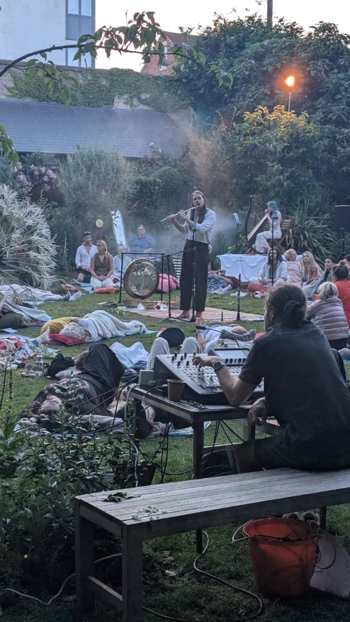 Outdoor performance with an audience on the grass